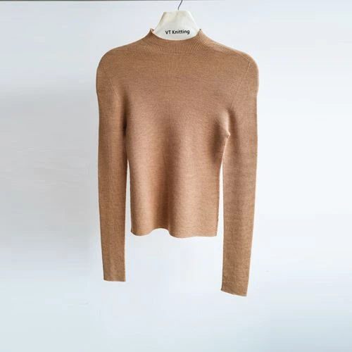 Suéter de cuello redondo de punto trenzado para mujer